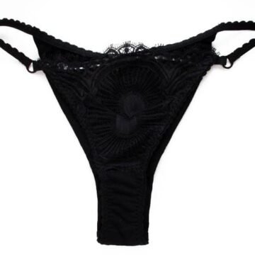 Sheer black lace panties shape tanga on the back