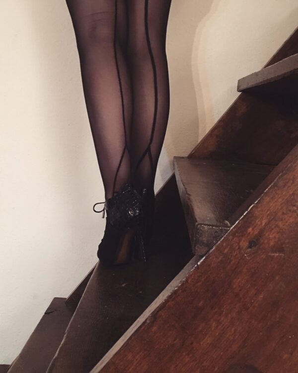 Black sheer couture stockings and high heels