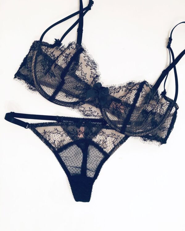 Sheer black lace lingerie set flatlay