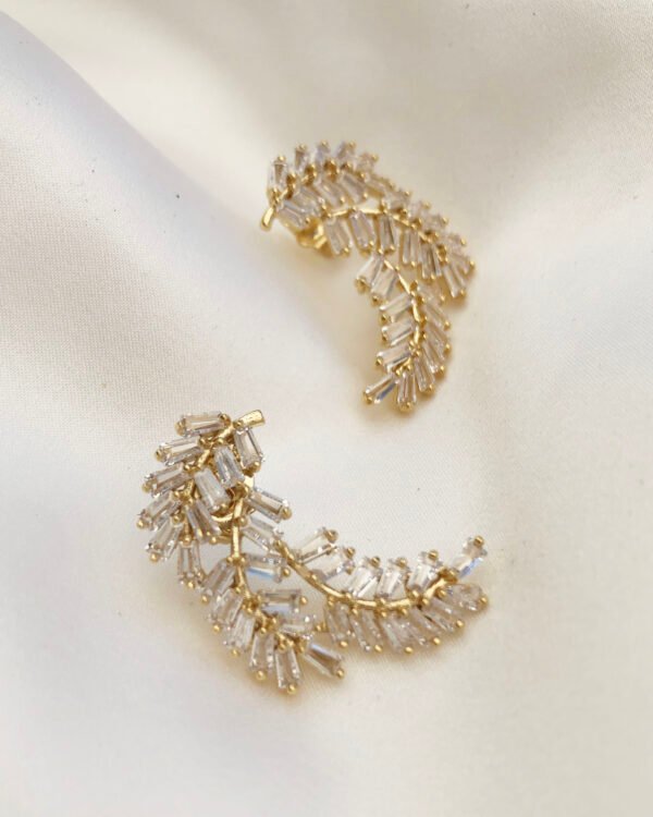 gold earrings with zircon crystal
