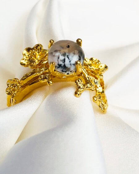 gold ring with merlinite