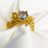 gold ring with merlinite