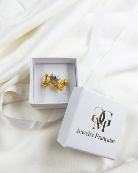 gold statement ring with merlinite